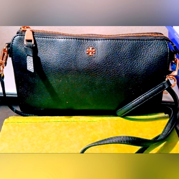 Tory Burch Black Leather Cross body Purse with brass buckle adjustable strap. - Picture 5 of 16